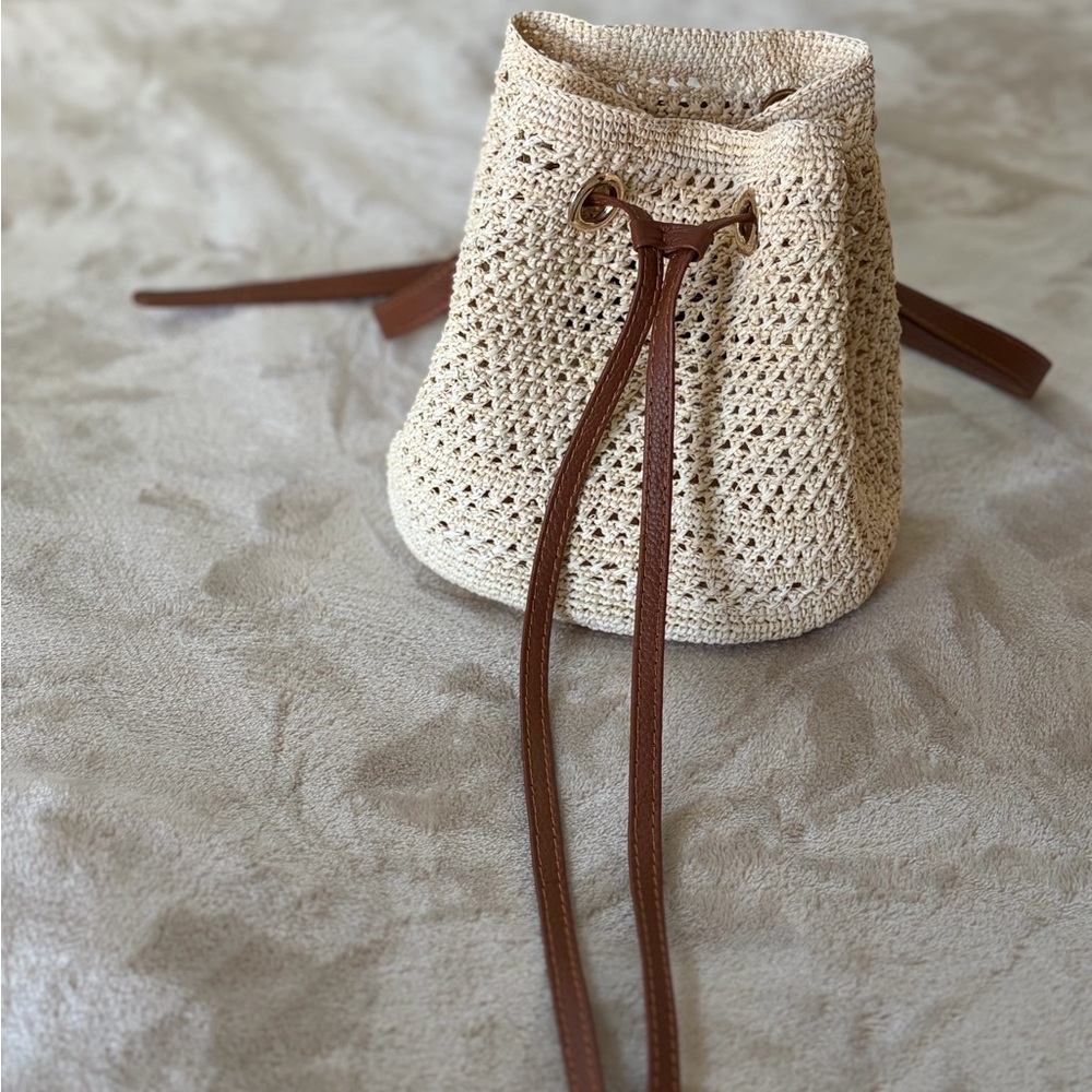 Sensi studio Cream weaved Drawstring hobo waist bag with Brown Straps
